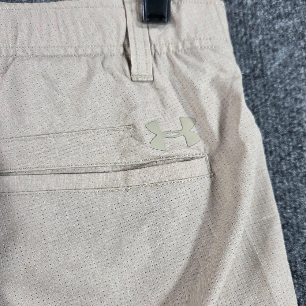 Under Armour deals away well